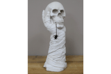 Hand Holding Skull Ornament 1