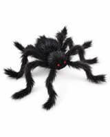 Black hairy poseable Halloween spider with eight legs and red bead eyes, shown on white
