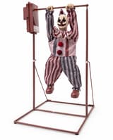 Animated clown Halloween prop hanging from its freestanding metal frame