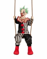 Green-haired clown with illuminated eyes on a rope swing, wearing black and white striped costume and red boots