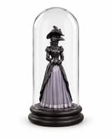 Crow-headed lady in a black Victorian bodice and grey skirt inside a tall glass dome on a dark wooden base