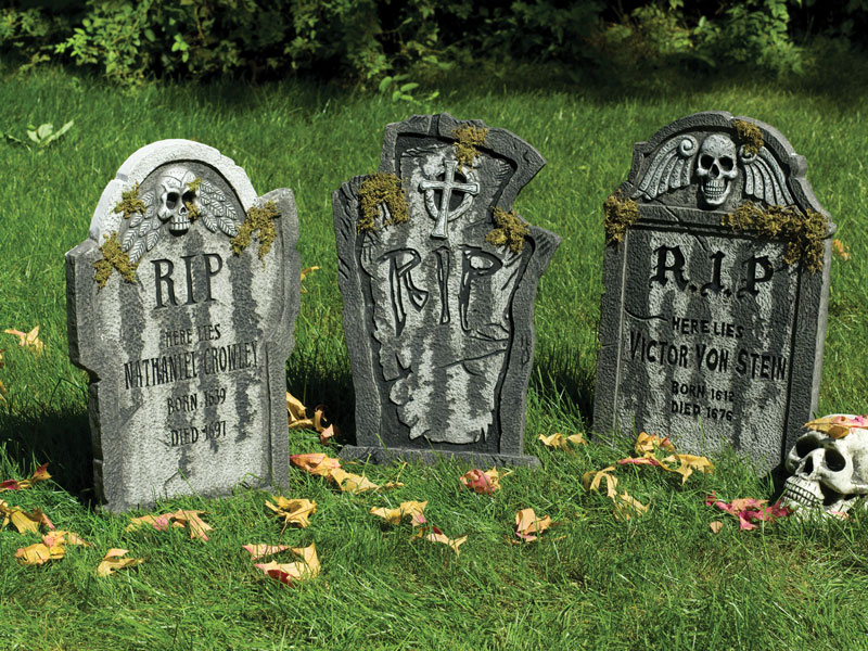 Supplier image showing three 56cm mossy Halloween tombstone designs