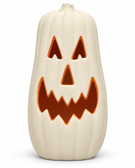 Tall white jack-o-lantern pumpkin with orange face details on white background