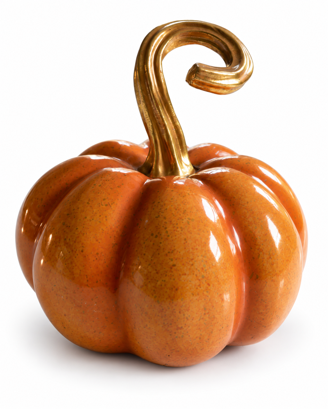Glossy orange ceramic pumpkin with speckled glaze and a curled gold-coloured stem on white