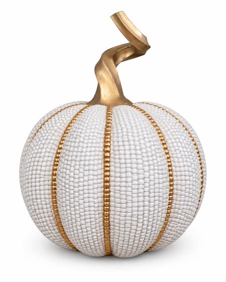 Pearl-white beaded pumpkin ornament with gold ribs and a tall twisted gold stem on white