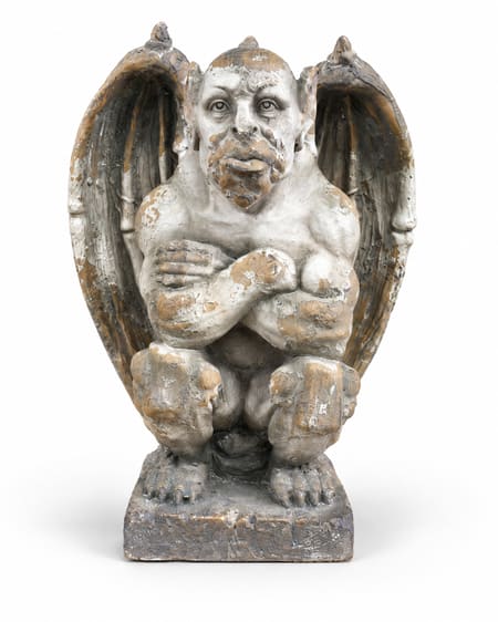 Crouching winged gargoyle with crossed arms and a distressed grey, white and brown stone-effect finish