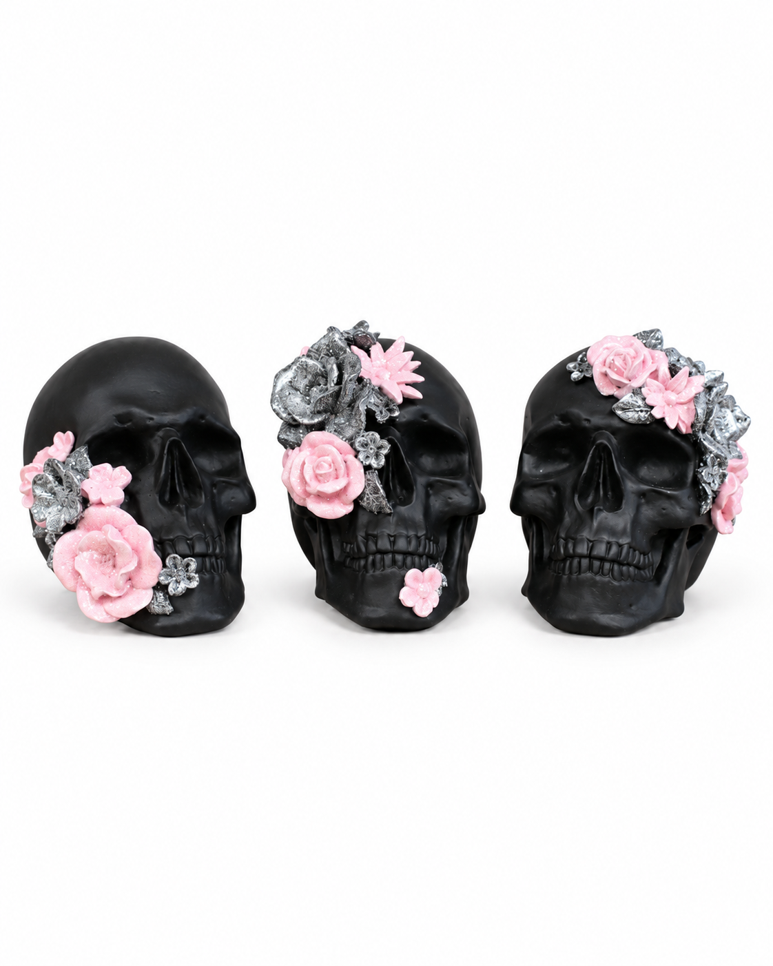 Three assorted black skull ornament designs with pink and silver glitter flowers; one design supplied at random