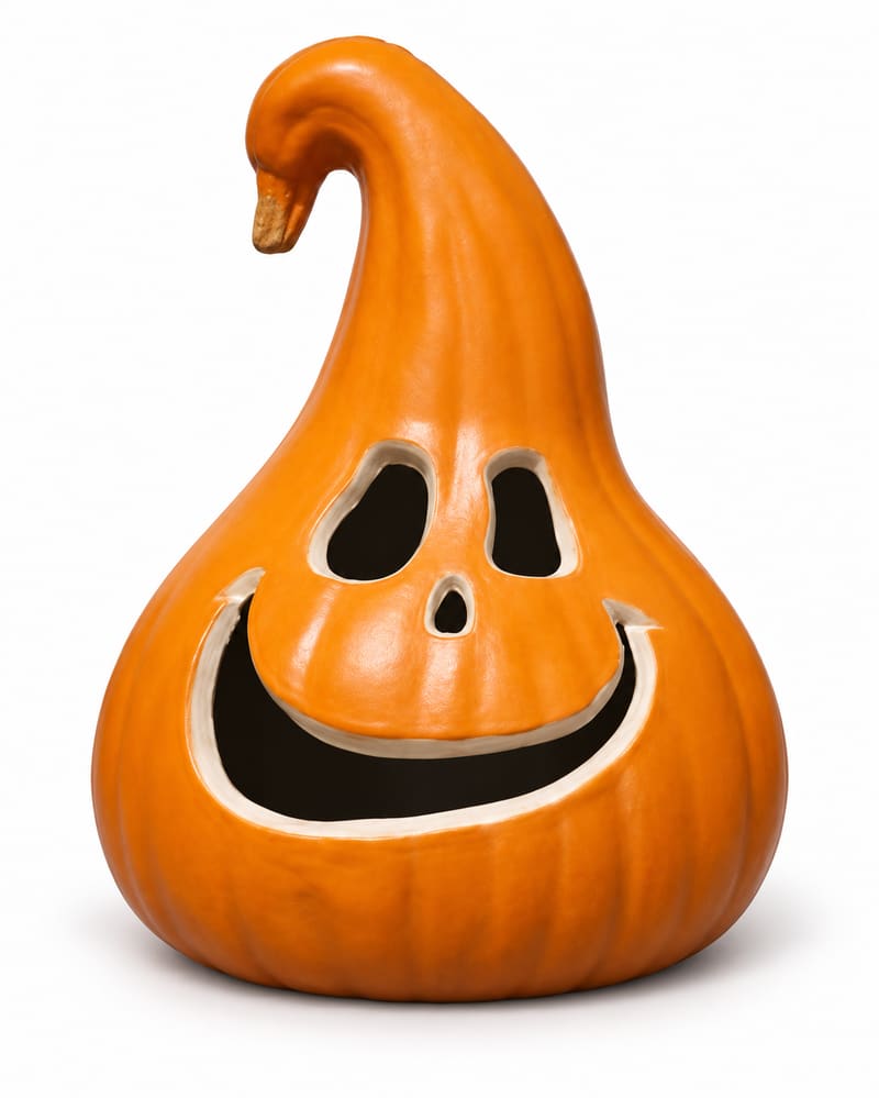 Orange smiling curly-neck gourd jack-o-lantern decoration on white background