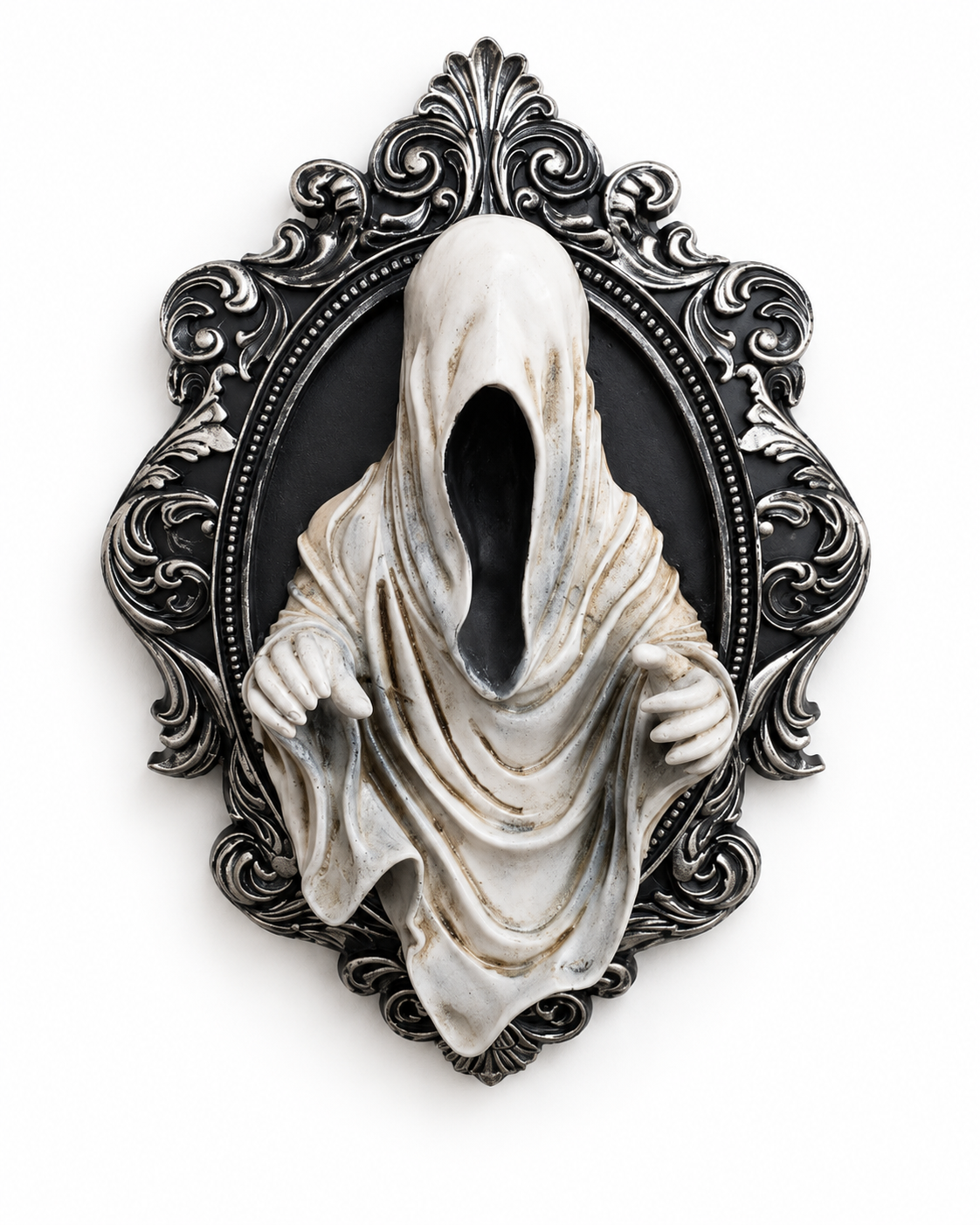 Ivory hooded faceless ghost emerging from an ornate oval black and antique silver frame
