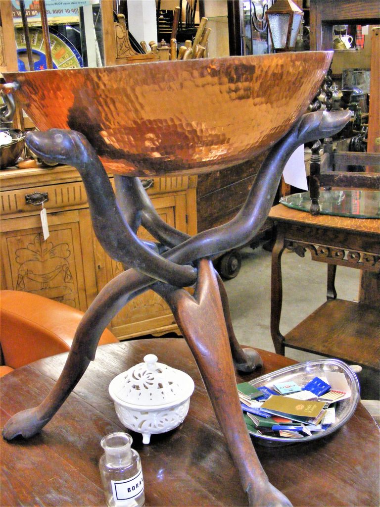 African Vessel on Carved Tripod