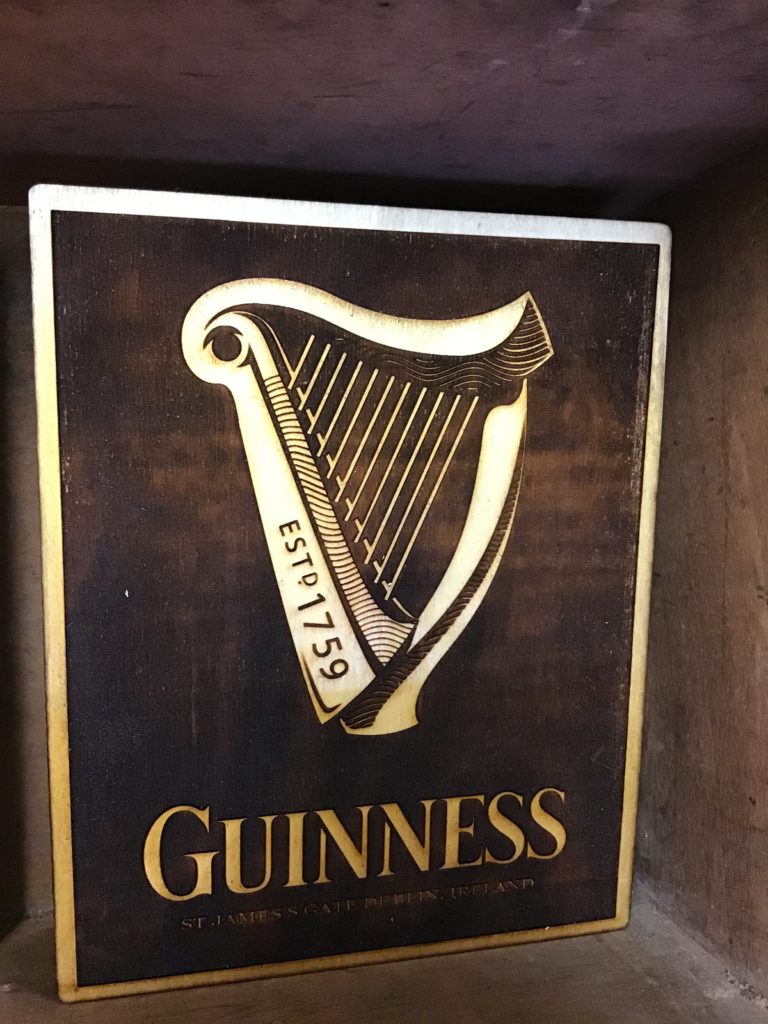 WOODEN PLAQUE GUINNESS DARK BACKGROUND
