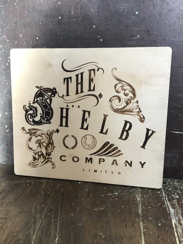 Shelby Company Wooden Plaque