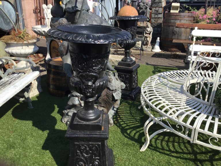 Pair of Cast Iron Urns