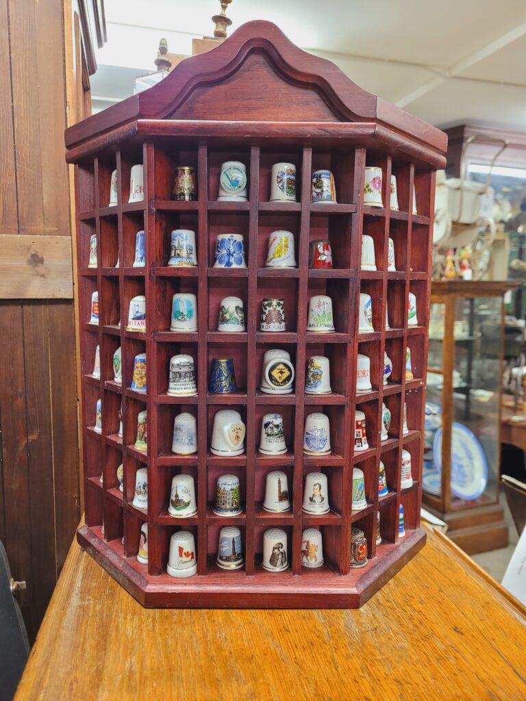79 Thimbles and Wooden Display