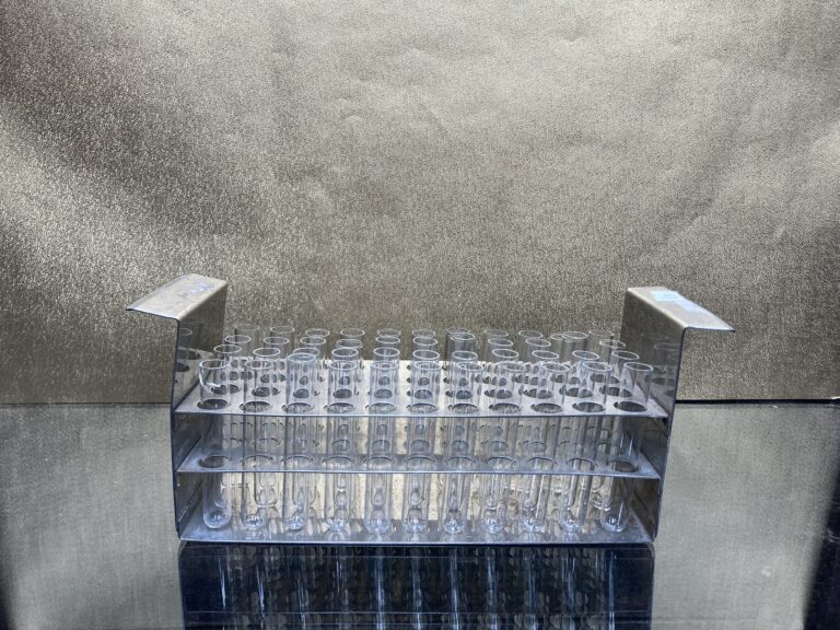 Vintage metal test tube rack with test tubes