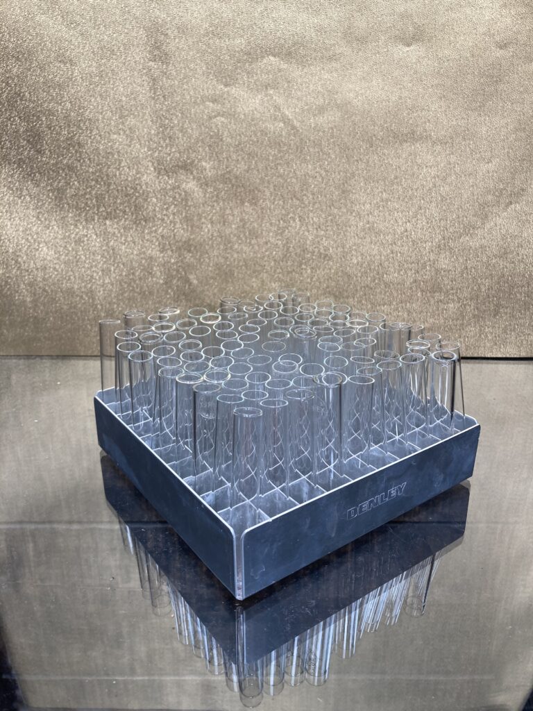 Vintage metal test tube rack with test tubes