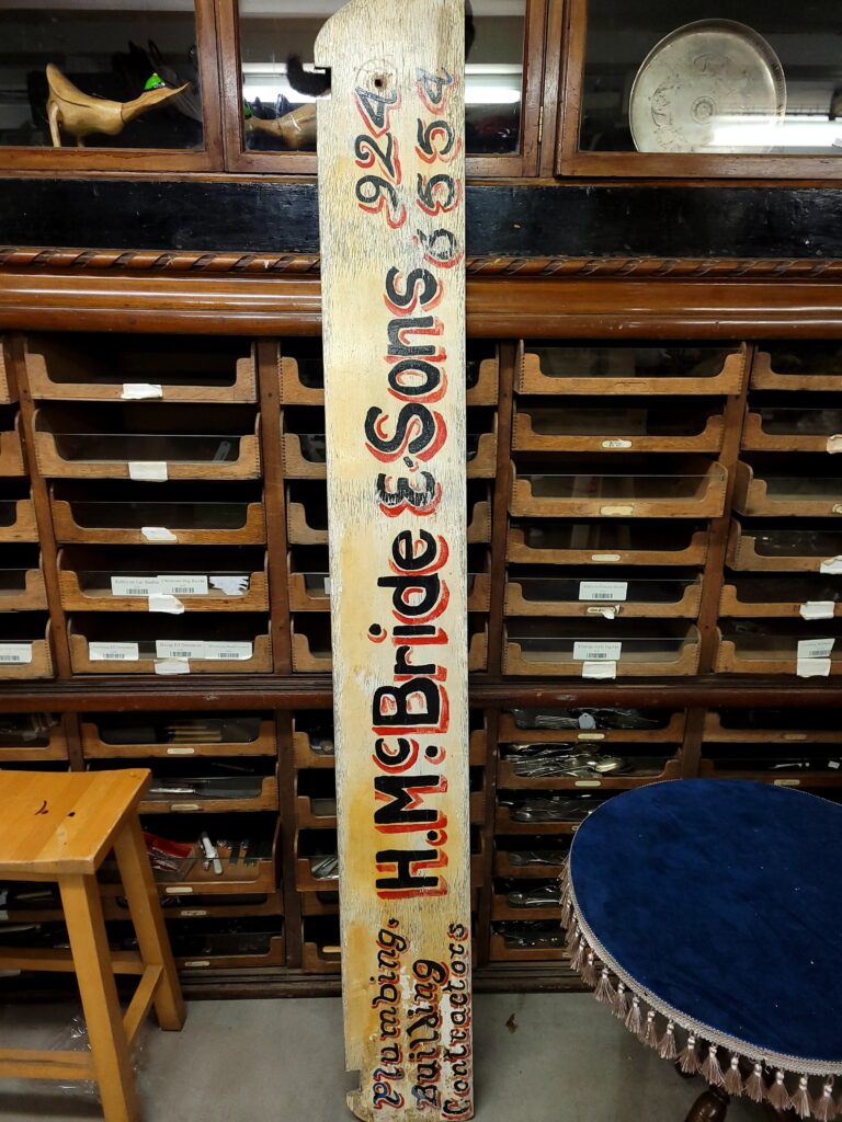 Handpainted H. McBride Sign
