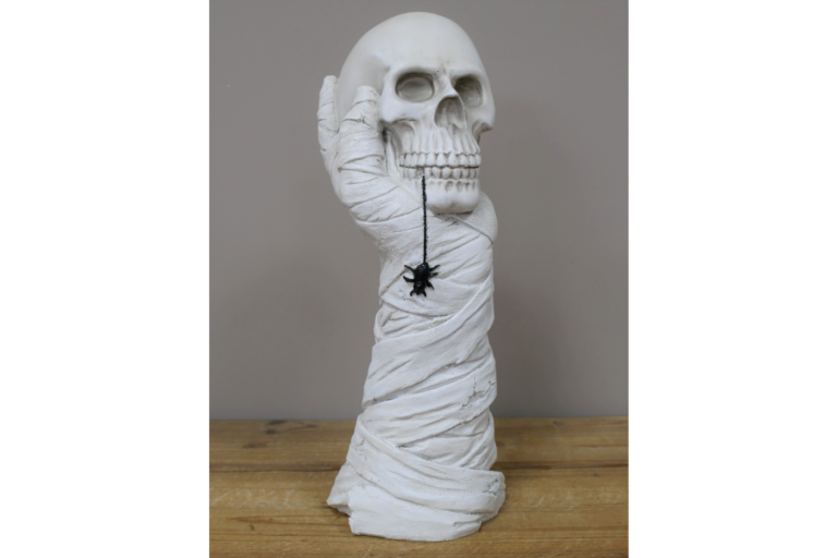 Hand Holding Skull Ornament