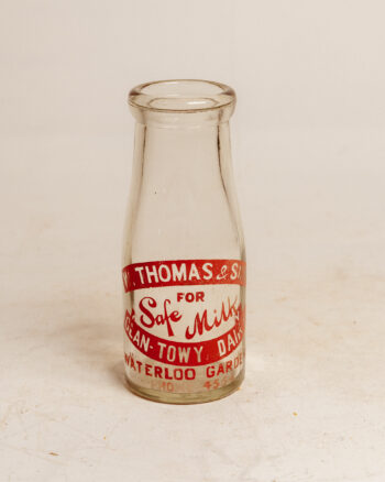 GB309 W. Thomas Milk Bottle