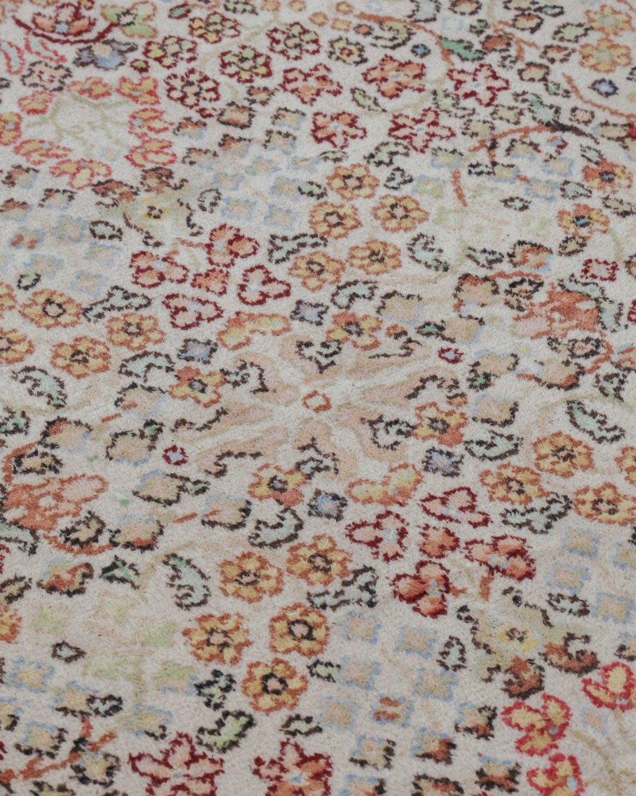 A close up on a floral pattern rug