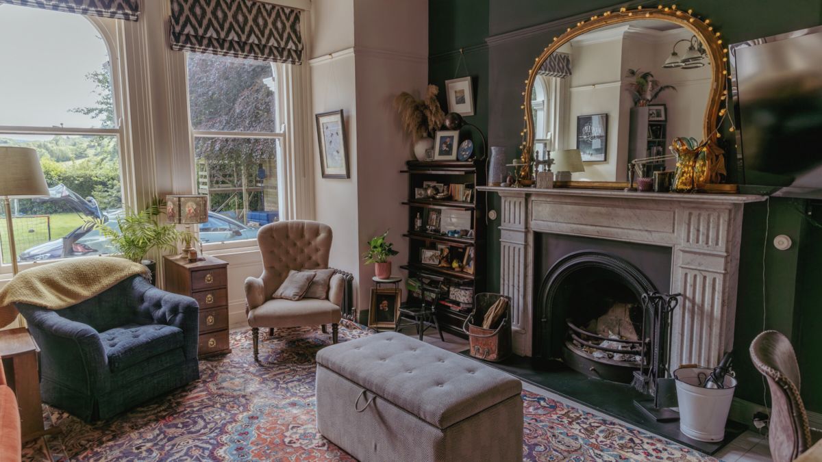 A wide shot of a vintage style living room.