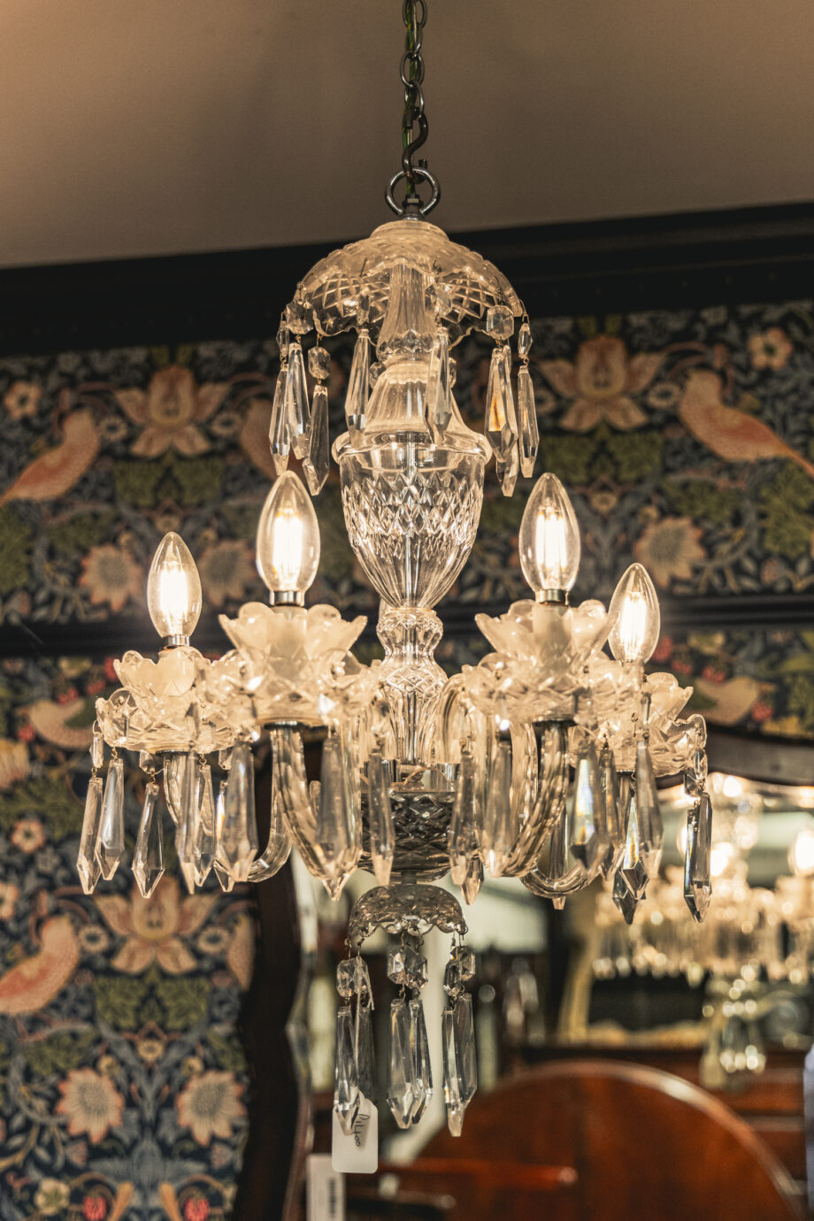 A crystal chandelier hanging from the ceiling