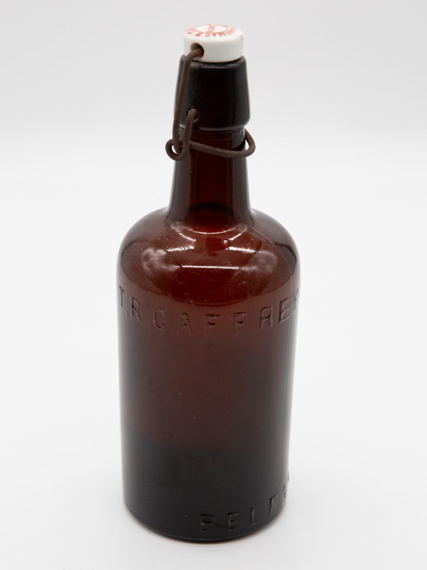 A dark brown bottle.
