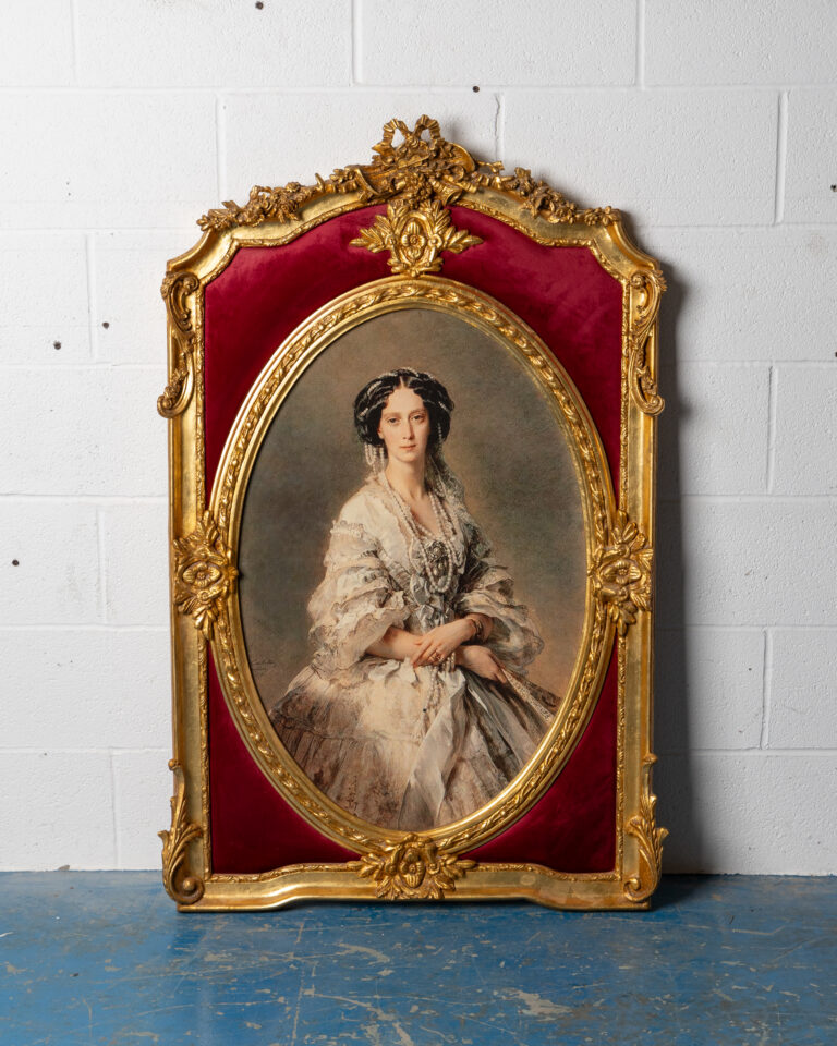 Large gilt frame of lady in gown
