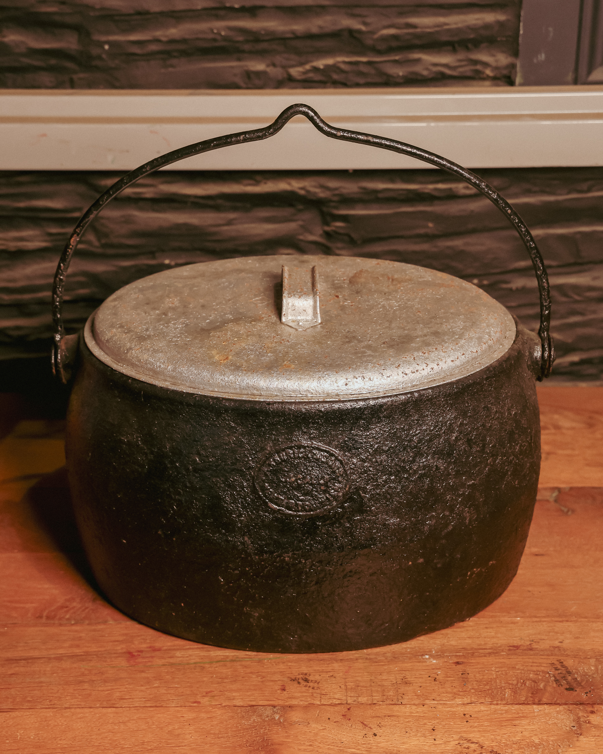 Black Cast iron pot with silver lid