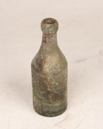 E. Johnson Openshaw Glass Bottle