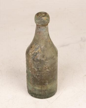 E. Johnson Openshaw Glass Bottle