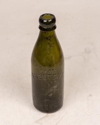 Vintage Skelton’s Carlisle Green Glass Bottle