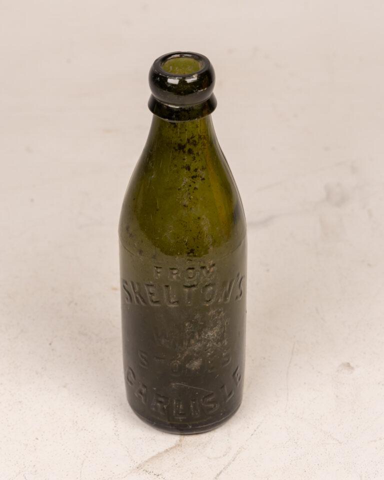 Vintage Skelton's Carlisle Green Glass Bottle
