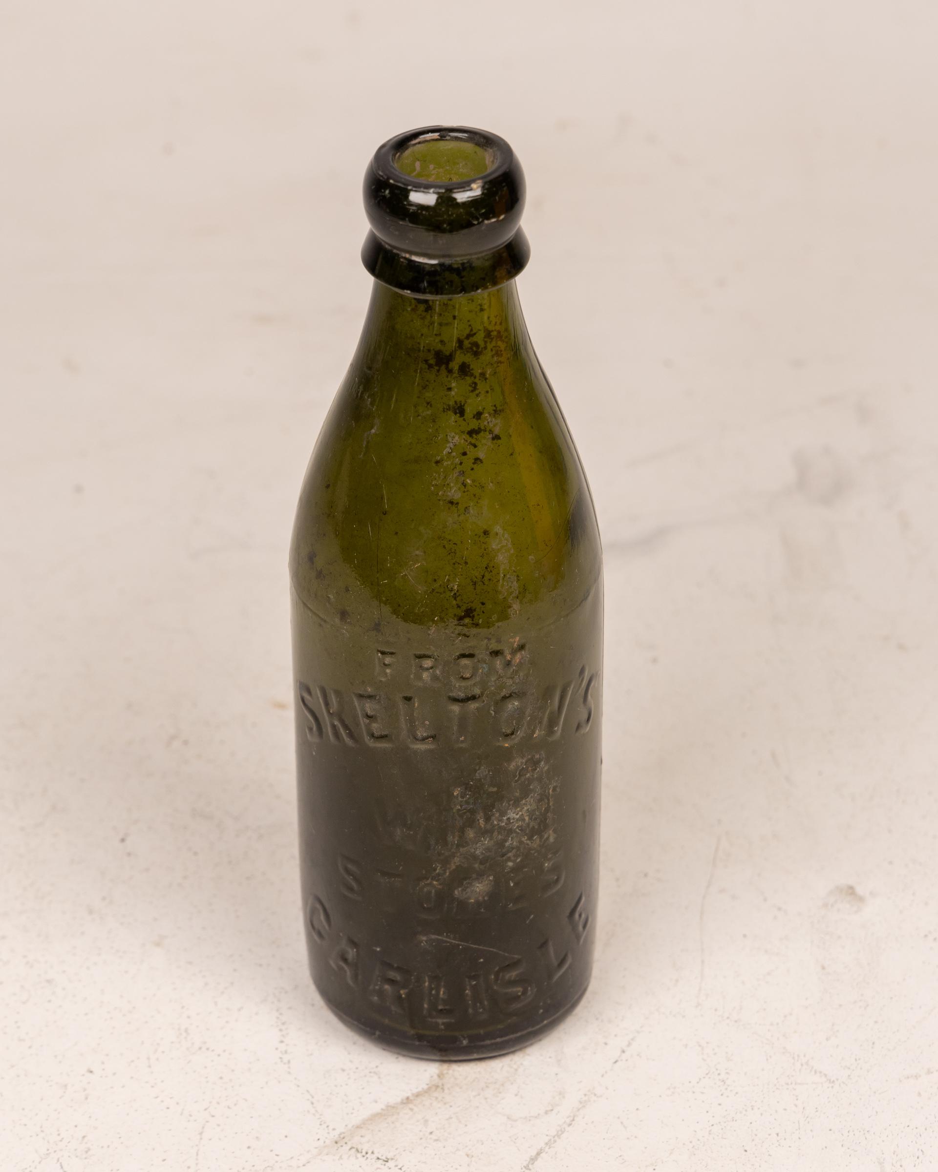 Vintage Skelton’s Carlisle Green Glass Bottle