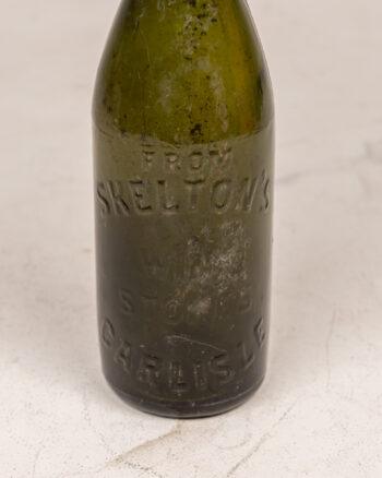 Vintage Skelton’s Carlisle Green Glass Bottle