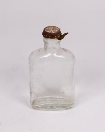 Vintage Clear Glass Bottle with Rusty Lid