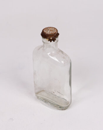 Vintage Clear Glass Bottle with Rusty Lid
