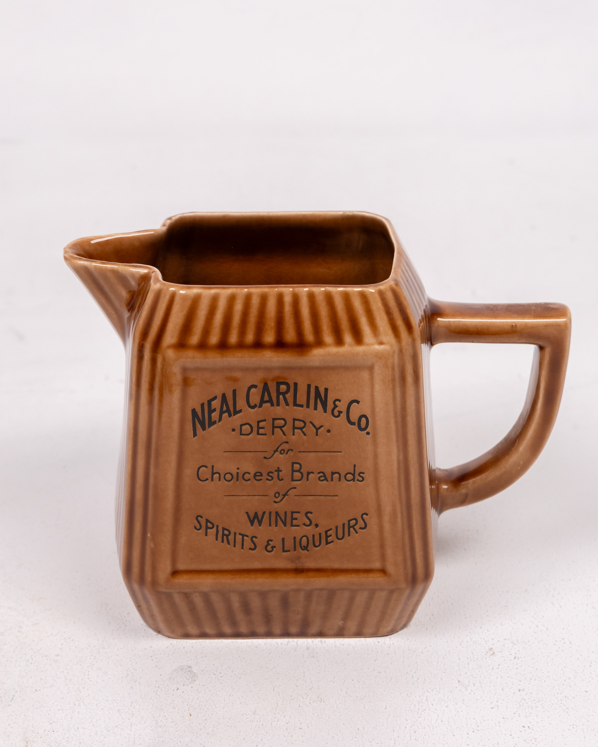 Neal Carlin & Co Derry Ceramic Advertising Jug