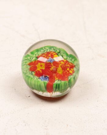 Vintage Glass Paperweight with Embedded Red Flower and Green Leaf Design