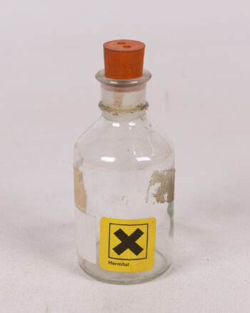Lab Bottle with ‘Harmful’ Label and Rubber Stopper