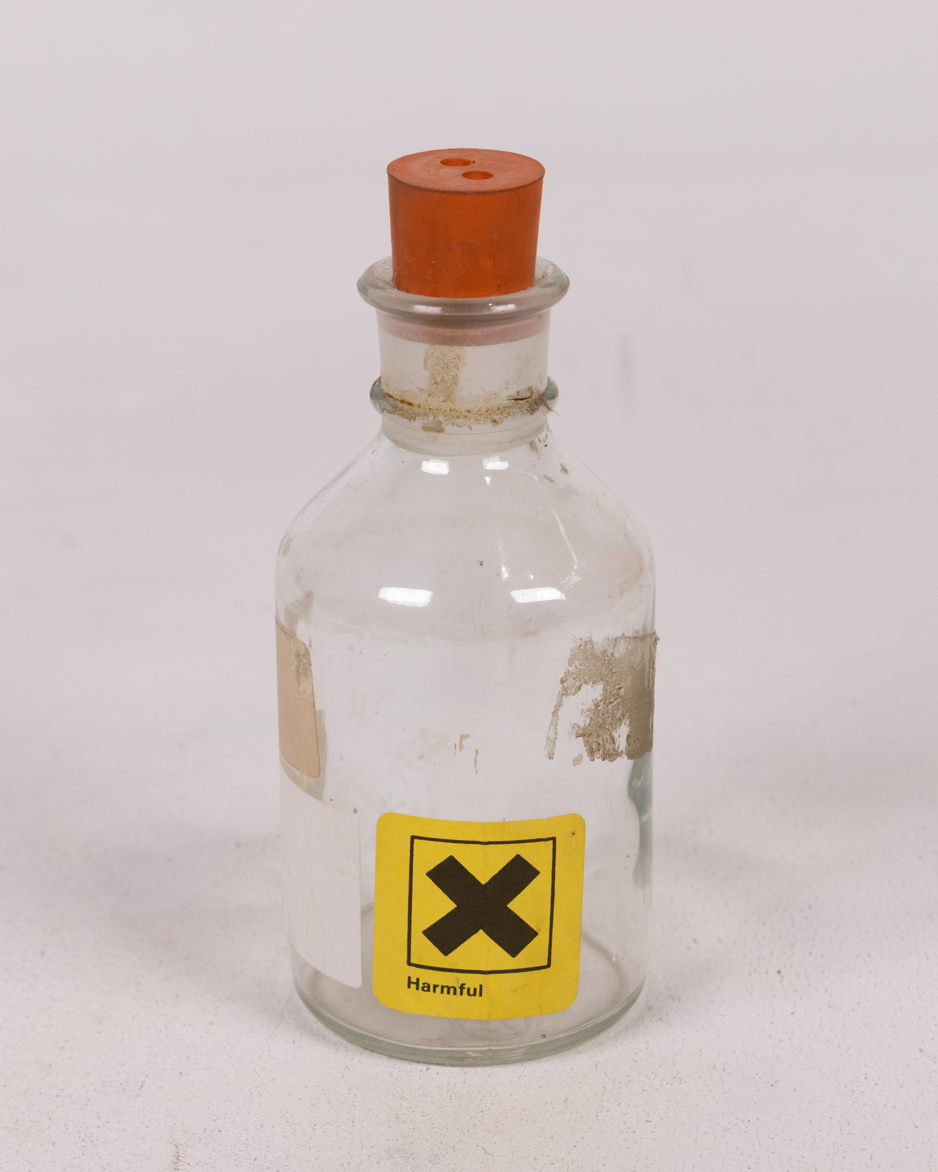 Lab Bottle with ‘Harmful’ Label and Rubber Stopper