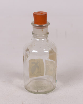 Lab Bottle with ‘Harmful’ Label and Rubber Stopper