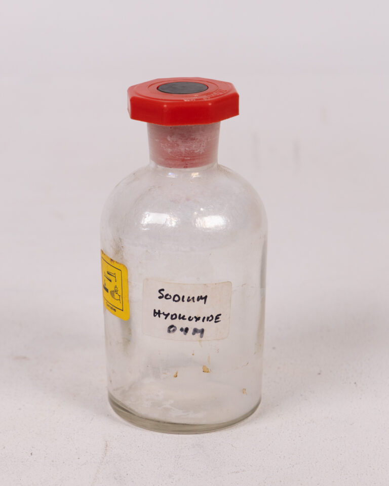 'Sodium Hydroxide' Lab Bottle with Red Stopper