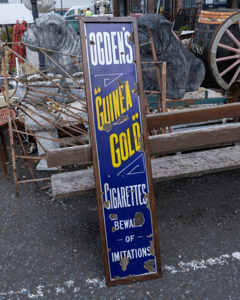 Ogden's "Guinea Gold" Cigarettes Enamel Sign with Wooden Frame