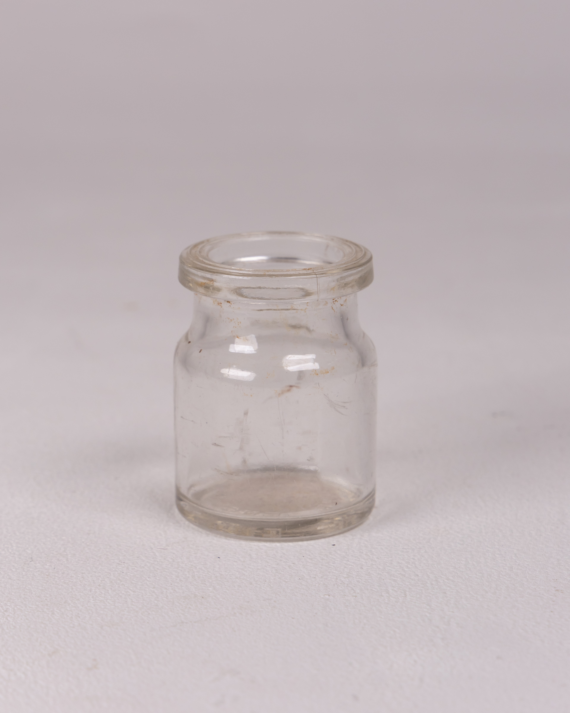 Small Clear Glass Apothecary Style Storage Jar with Round Body