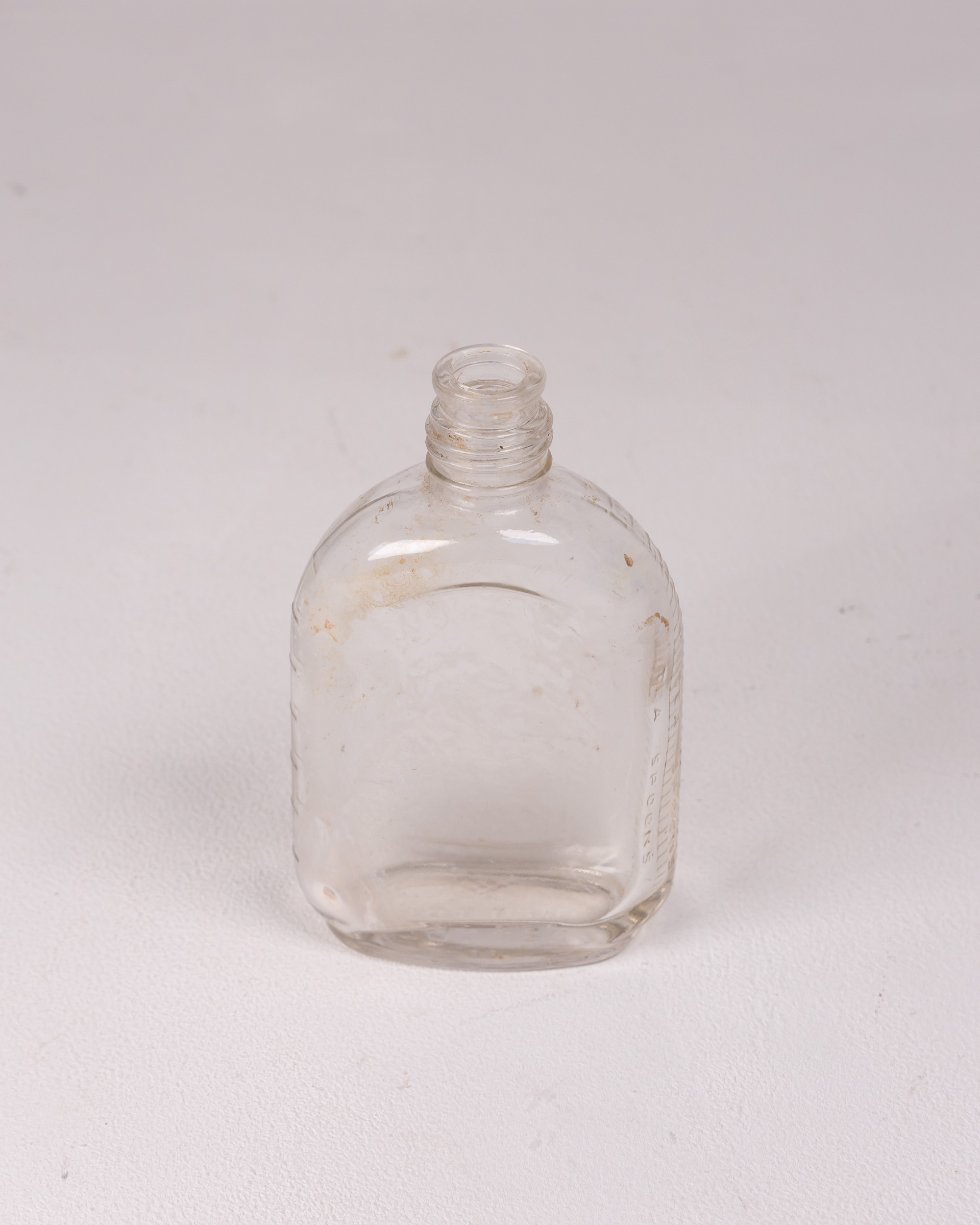 Vintage Clear Glass Bottle, Embossed Details, Collectible Glassware
