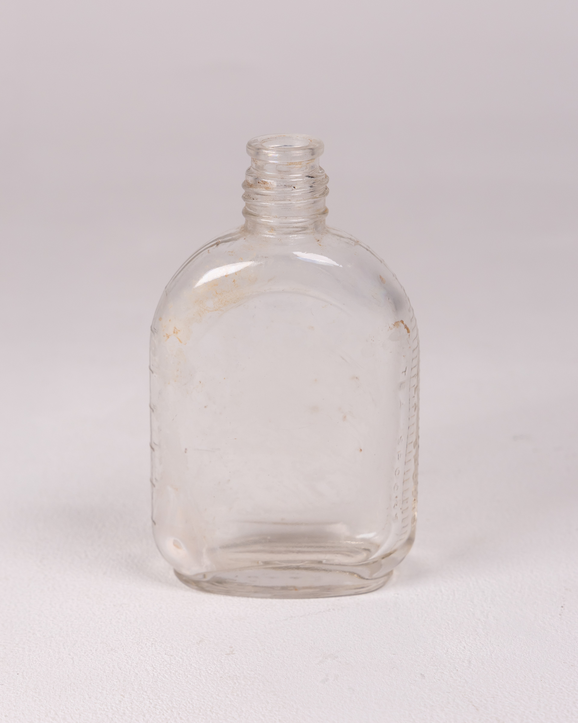 Vintage Clear Glass Bottle, Embossed Details, Collectible Glassware - Image 2