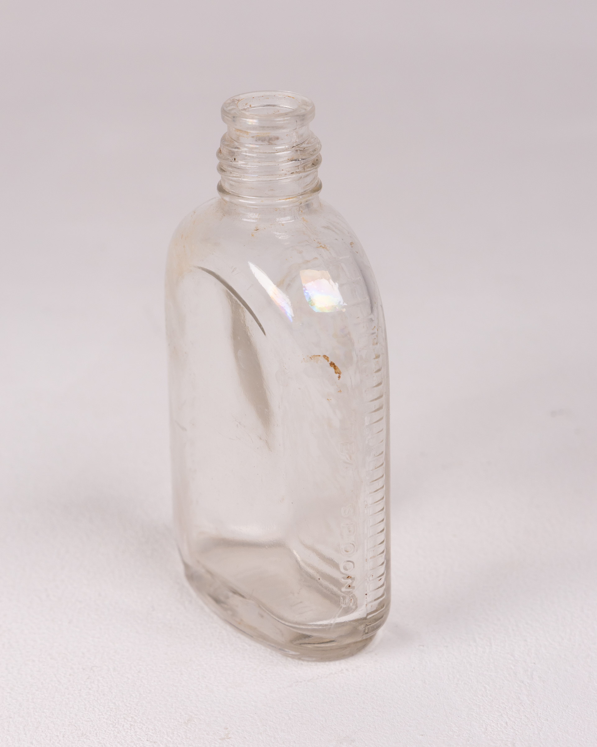 Vintage Clear Glass Bottle, Embossed Details, Collectible Glassware - Image 3