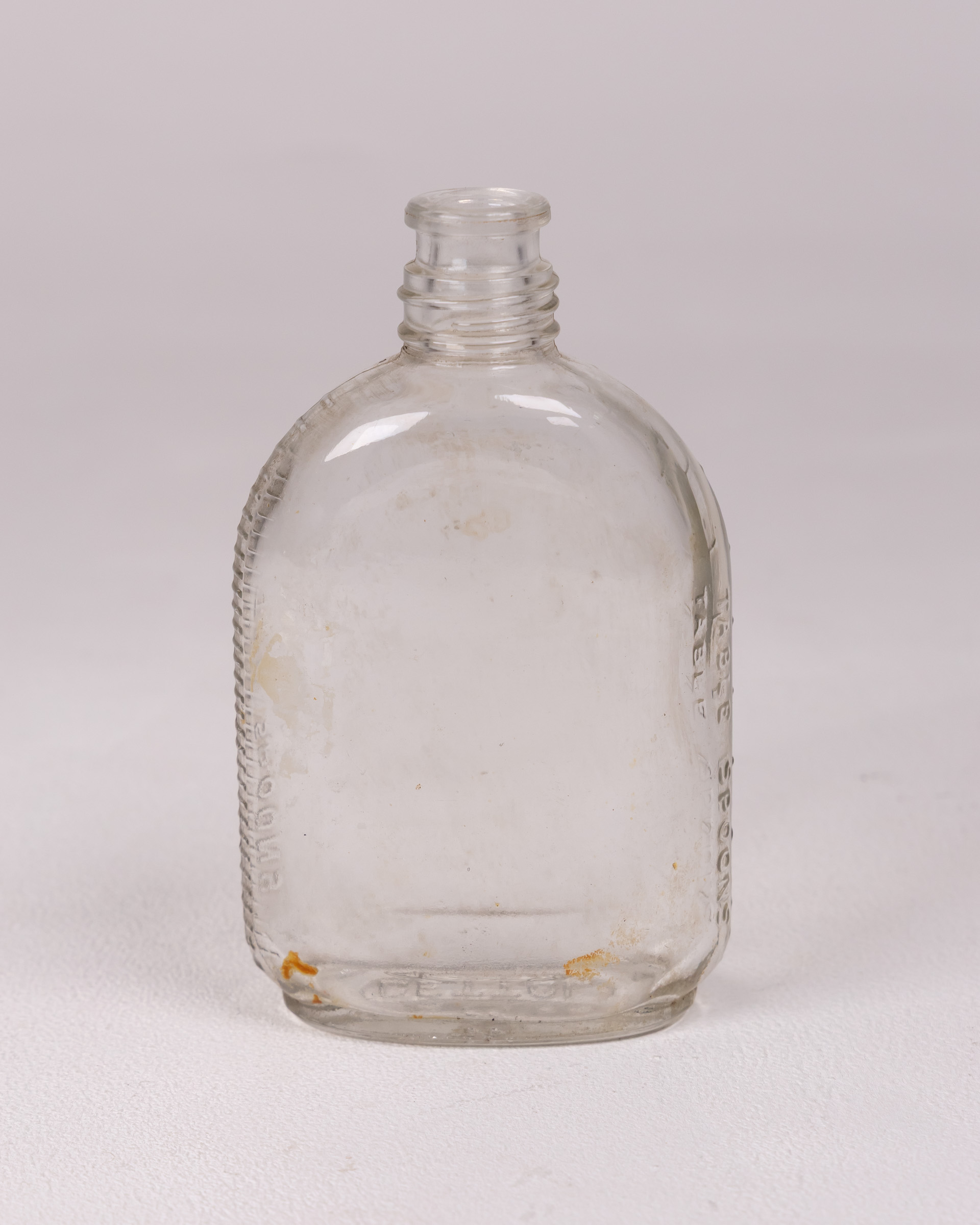Vintage Clear Glass Apothecary Bottle with Embossed Text – Small