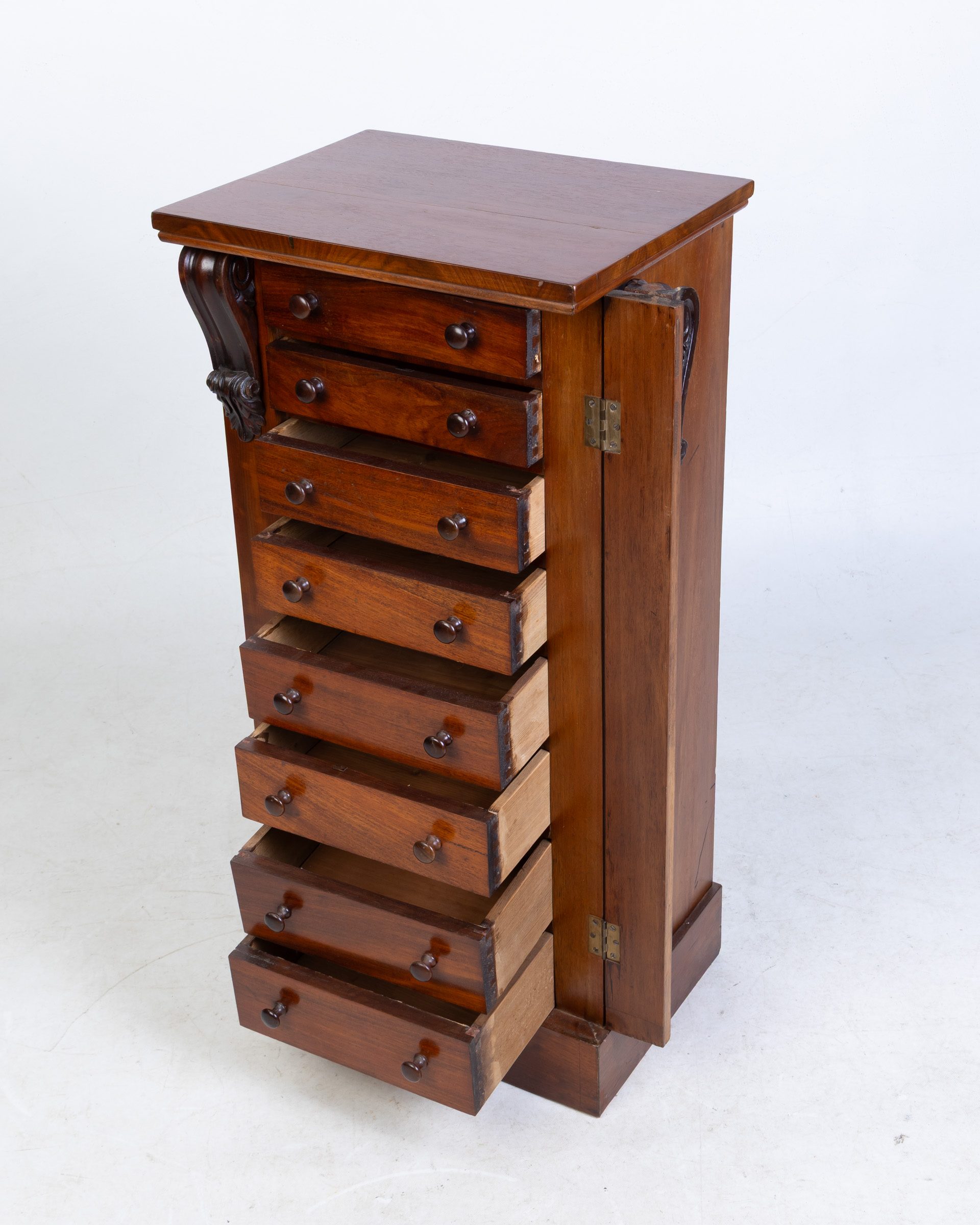 Antique Mahogany Wellington Chest with Detailed Carvings